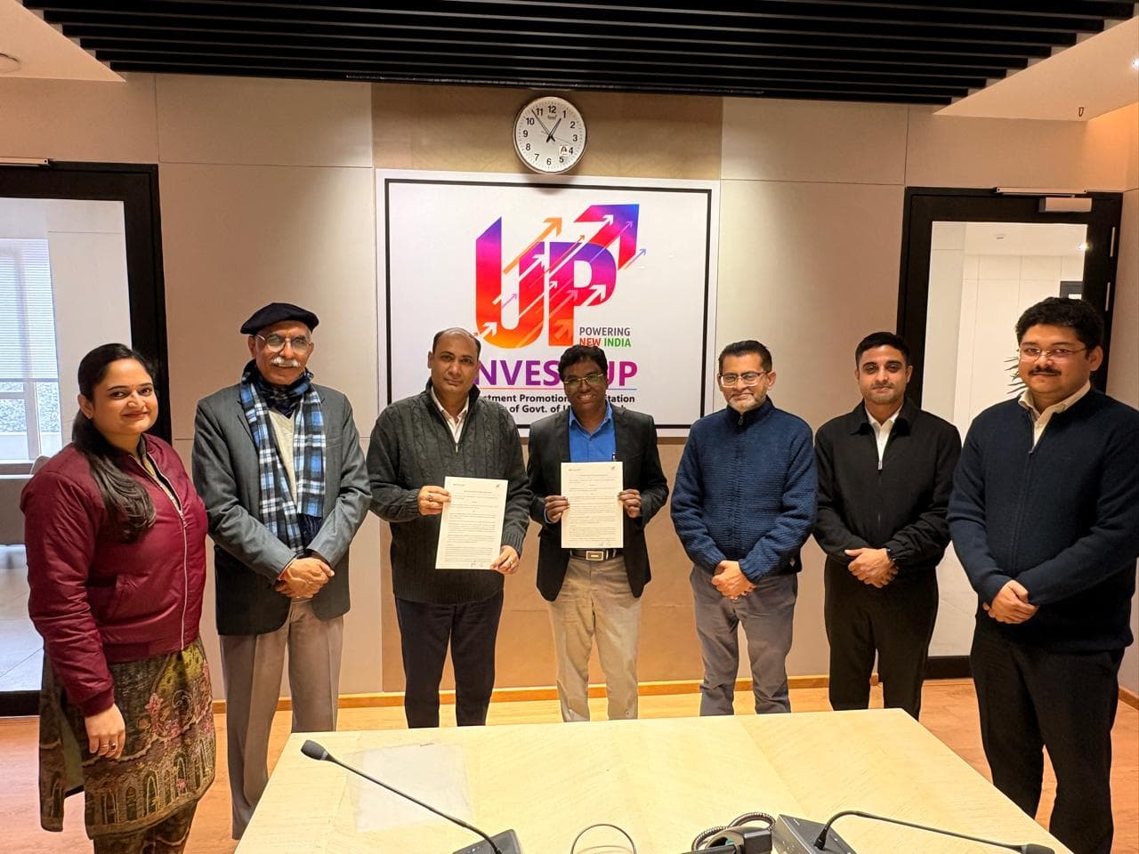 Kenpath CEO Munee signing MoU with Invest UP